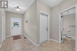 View to Garage Door and Bathroom - 
