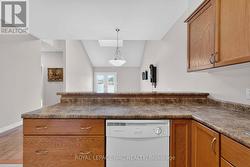 Kitchen Overlooks Great Room - 