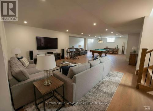 AI Generated Concept - Basement - 5 Jean Miller Court, Springwater, ON - Indoor Photo Showing Living Room