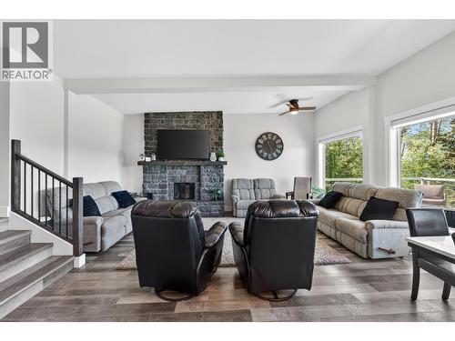 13239 Paradise Street, Fort St. John, BC - Indoor Photo Showing Living Room With Fireplace