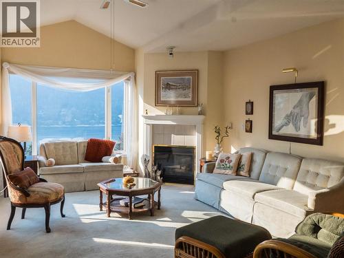 38 High Street Unit# 307, Nelson, BC - Indoor Photo Showing Living Room With Fireplace