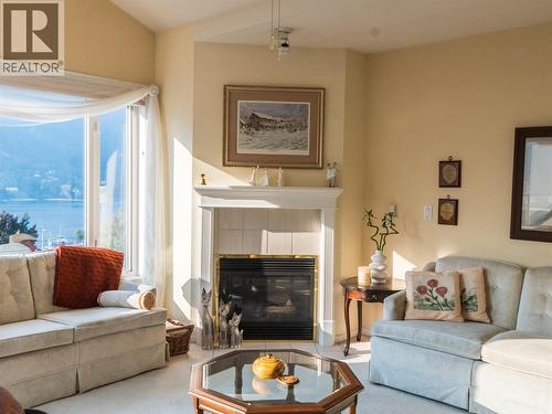 38 High Street Unit# 307, Nelson, BC - Indoor Photo Showing Living Room With Fireplace