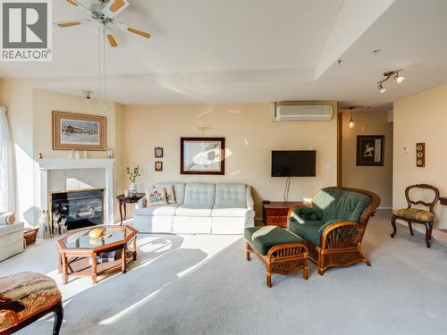 38 High Street Unit# 307, Nelson, BC - Indoor Photo Showing Living Room With Fireplace