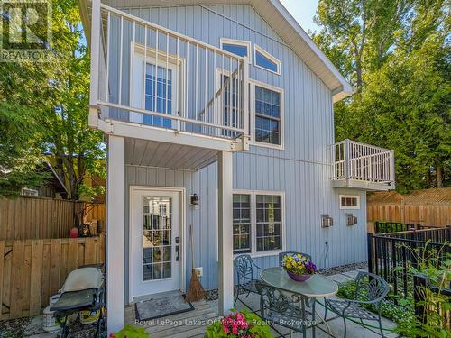 CARRIAGE HS: Primary Suite Deck & Main Entrance - 212 James Street, Bracebridge, ON - Outdoor With Exterior