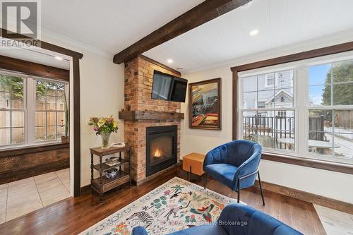 CARRIAGE HS: Living Area - 212 James Street, Bracebridge, ON - Indoor Photo Showing Living Room With Fireplace