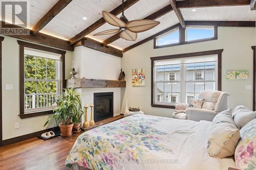 CARRIAGE HS: Bedroom (2nd Floor) - 212 James Street, Bracebridge, ON - Indoor Photo Showing Bedroom With Fireplace