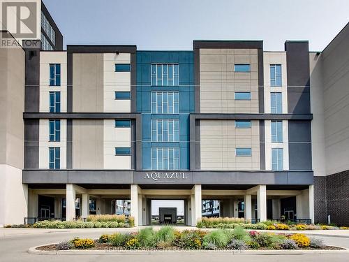 318 - 16 Concord Place, Grimsby, ON - Outdoor With Facade