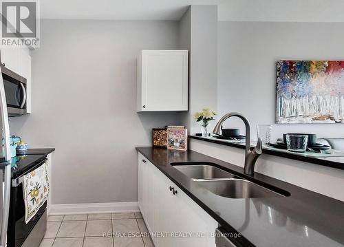 318 - 16 Concord Place, Grimsby, ON - Indoor Photo Showing Kitchen With Double Sink