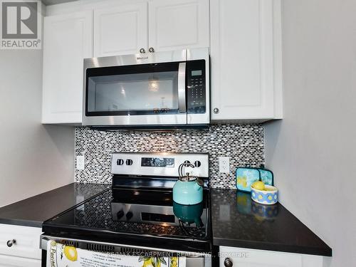 318 - 16 Concord Place, Grimsby, ON - Indoor Photo Showing Kitchen With Upgraded Kitchen
