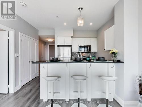 318 - 16 Concord Place, Grimsby, ON - Indoor Photo Showing Kitchen With Upgraded Kitchen