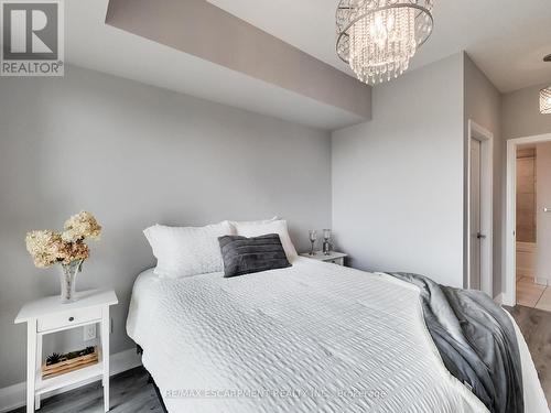318 - 16 Concord Place, Grimsby, ON - Indoor Photo Showing Bedroom