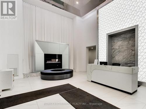 318 - 16 Concord Place, Grimsby, ON - Indoor With Fireplace