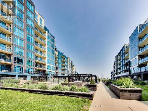 318 - 16 Concord Place, Grimsby, ON - Outdoor With Balcony With Facade