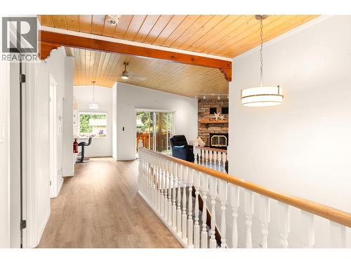 Unique features in this home ceiling & beams - 1587 Pratico Road, Revelstoke, BC - Indoor Photo Showing Other Room