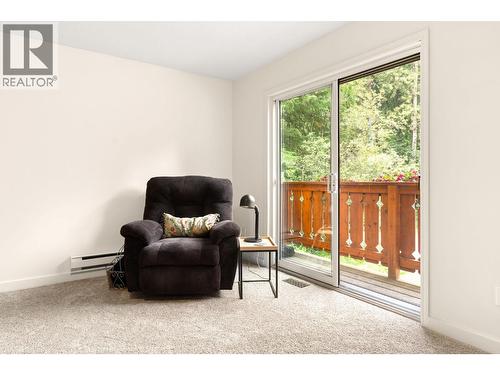 Spare Bedroom main floor with sliding doors - 1587 Pratico Road, Revelstoke, BC - Indoor Photo Showing Other Room