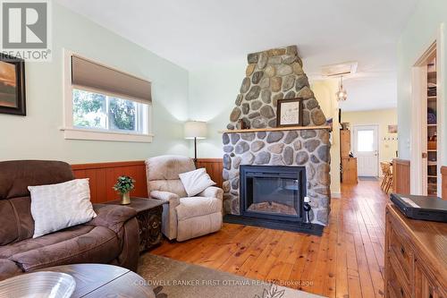 127 Rose Mac Drive, Drummond/North Elmsley, ON - Indoor Photo Showing Living Room With Fireplace