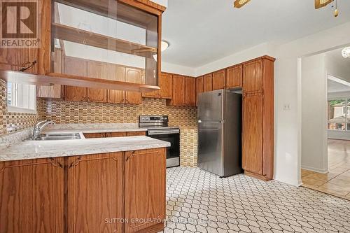 164 Robina Avenue W, Toronto, ON - Indoor Photo Showing Kitchen With Double Sink