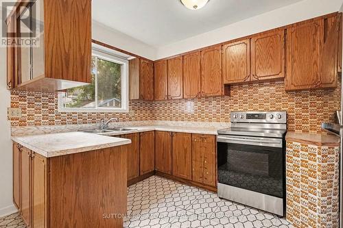 164 Robina Avenue W, Toronto, ON - Indoor Photo Showing Kitchen With Double Sink
