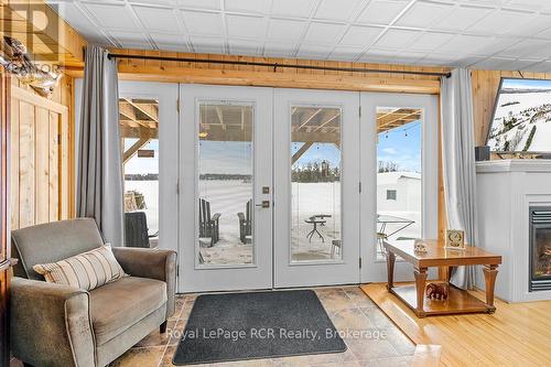 LOWER LEVEL WALKOUT - 48 Island View Drive N, South Bruce Peninsula, ON - Indoor With Fireplace