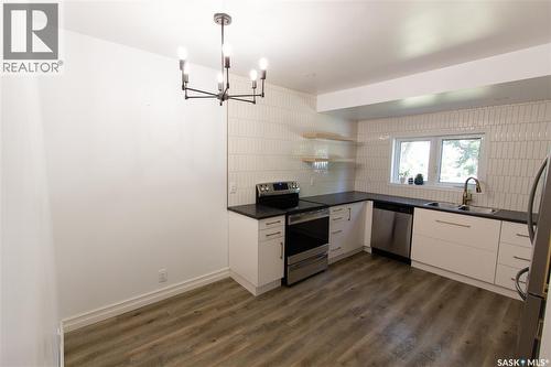 376 6Th Avenue Nw, Swift Current, SK - Indoor Photo Showing Kitchen With Double Sink With Upgraded Kitchen
