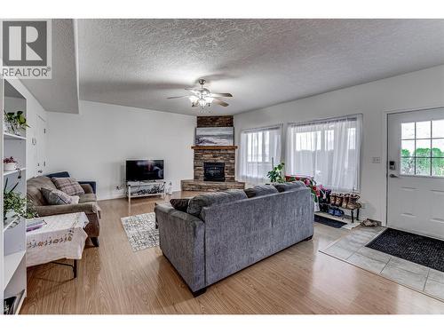 Legal Suite - 108 Red Rock Crescent, Enderby, BC - Indoor Photo Showing Living Room With Fireplace