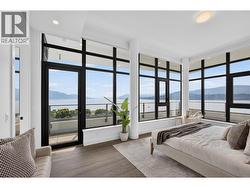 Spacious primary suite with direct patio access - 