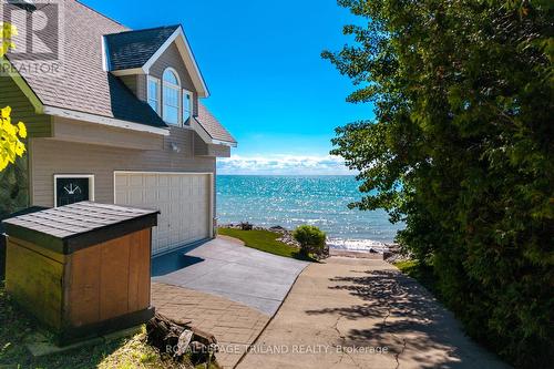 73437 Sandy Beach Road, Bluewater (Hay), ON - Outdoor With Body Of Water