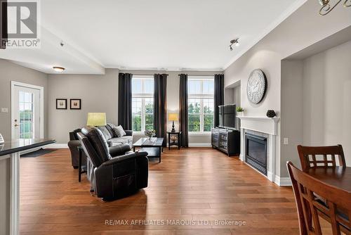 402 - 341 Water Street W, Cornwall, ON - Indoor Photo Showing Living Room With Fireplace