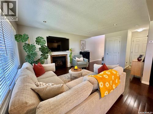 18 1600 Muzzy Drive, Prince Albert, SK - Indoor Photo Showing Living Room With Fireplace