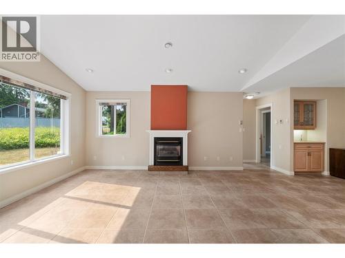 151 25 Street Ne, Salmon Arm, BC - Indoor With Fireplace
