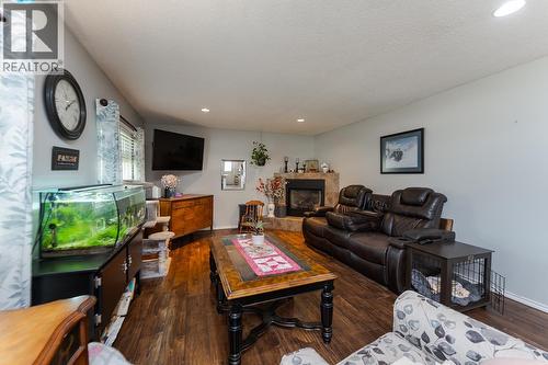 7389 Elk Road, Prince George, BC - Indoor Photo Showing Living Room With Fireplace