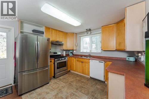 7389 Elk Road, Prince George, BC - Indoor Photo Showing Kitchen With Double Sink
