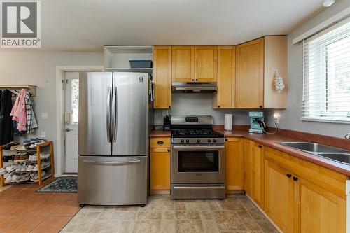 7389 Elk Road, Prince George, BC - Indoor Photo Showing Kitchen With Double Sink