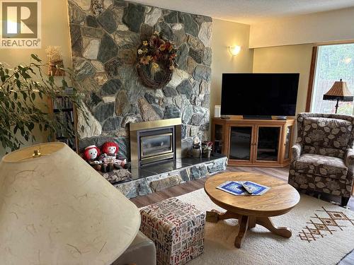 404 N Birch Avenue, 100 Mile House, BC - Indoor Photo Showing Living Room With Fireplace