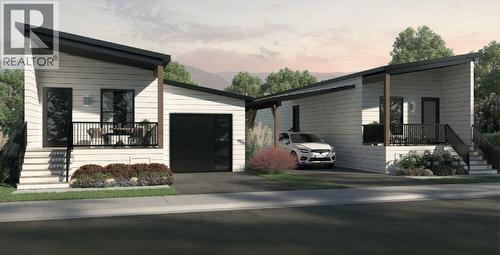 WOODLARK 2 BEDROOM Developers Rendering. Base model comes with carport as standard. - 8900 Jim Bailey Road Unit# 167, Kelowna, BC 