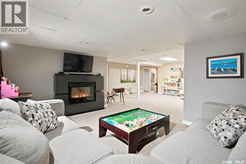 111 Minot Drive, Regina, SK - Indoor Photo Showing Other Room With Fireplace