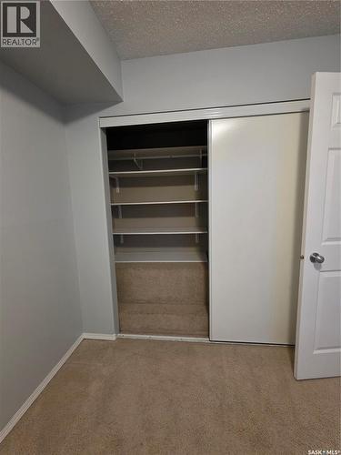 205 701 Henry Street, Estevan, SK - Indoor Photo Showing Other Room
