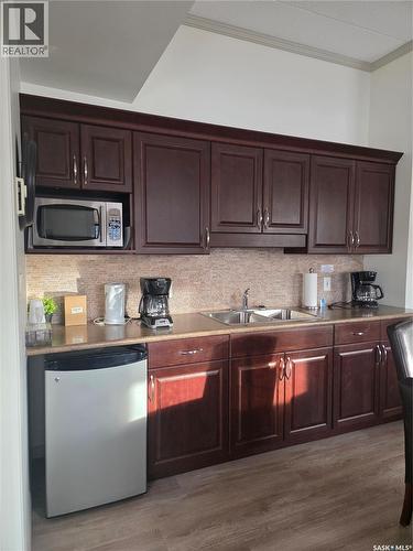205 701 Henry Street, Estevan, SK - Indoor Photo Showing Kitchen With Double Sink