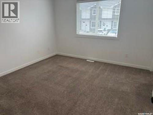 35 4850 Harbour Landing Drive, Regina, SK - Indoor Photo Showing Other Room