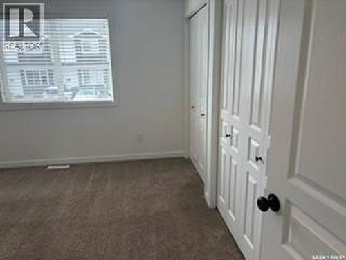 35 4850 Harbour Landing Drive, Regina, SK - Indoor Photo Showing Other Room