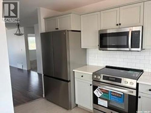 35 4850 Harbour Landing Drive, Regina, SK - Indoor Photo Showing Kitchen
