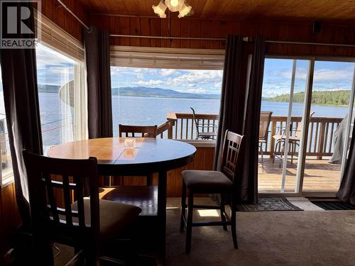 23397 Stella Road, Fraser Lake, BC - Indoor Photo Showing Dining Room With Body Of Water