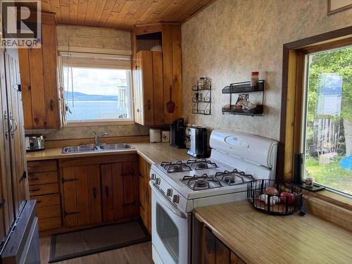 23397 Stella Road, Fraser Lake, BC - Indoor Photo Showing Kitchen With Double Sink