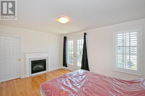 1 Mackenzie'S Stand Avenue, Markham, ON - Indoor Photo Showing Bedroom With Fireplace