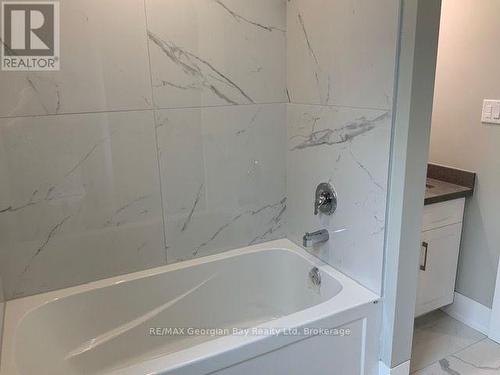 5 Oakwood Avenue S, Tiny, ON - Indoor Photo Showing Bathroom