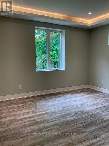 5 Oakwood Avenue S, Tiny, ON - Indoor Photo Showing Other Room