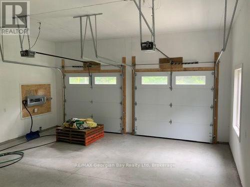 5 Oakwood Avenue S, Tiny, ON - Indoor Photo Showing Garage