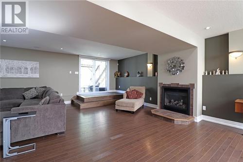 3086 Rebecca Street, Val Caron, ON - Indoor Photo Showing Living Room With Fireplace