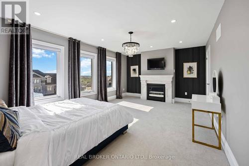 2236 Pemberton Way, Innisfil, ON - Indoor Photo Showing Bedroom With Fireplace