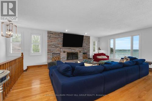 3686 Portage Bay Road, Ramara, ON - Indoor Photo Showing Living Room With Fireplace
